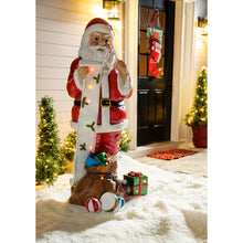 Load image into Gallery viewer, 55&quot;H Solar Santa Claus Checking His List Statement Garden Statue
