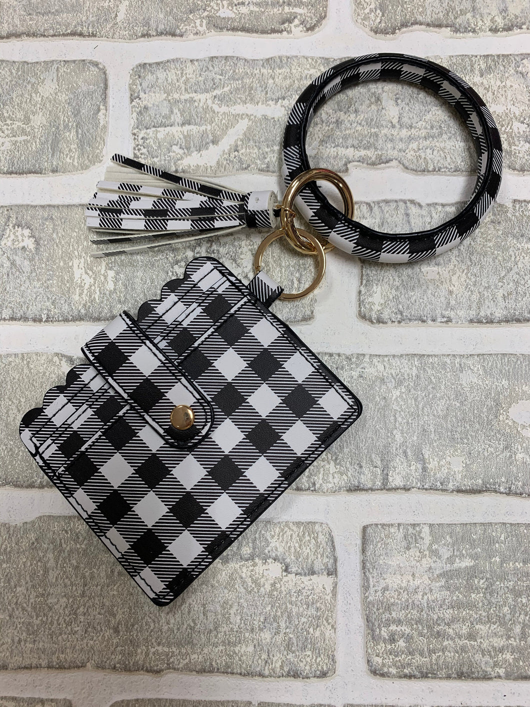 White and black bangle with wallet keychain