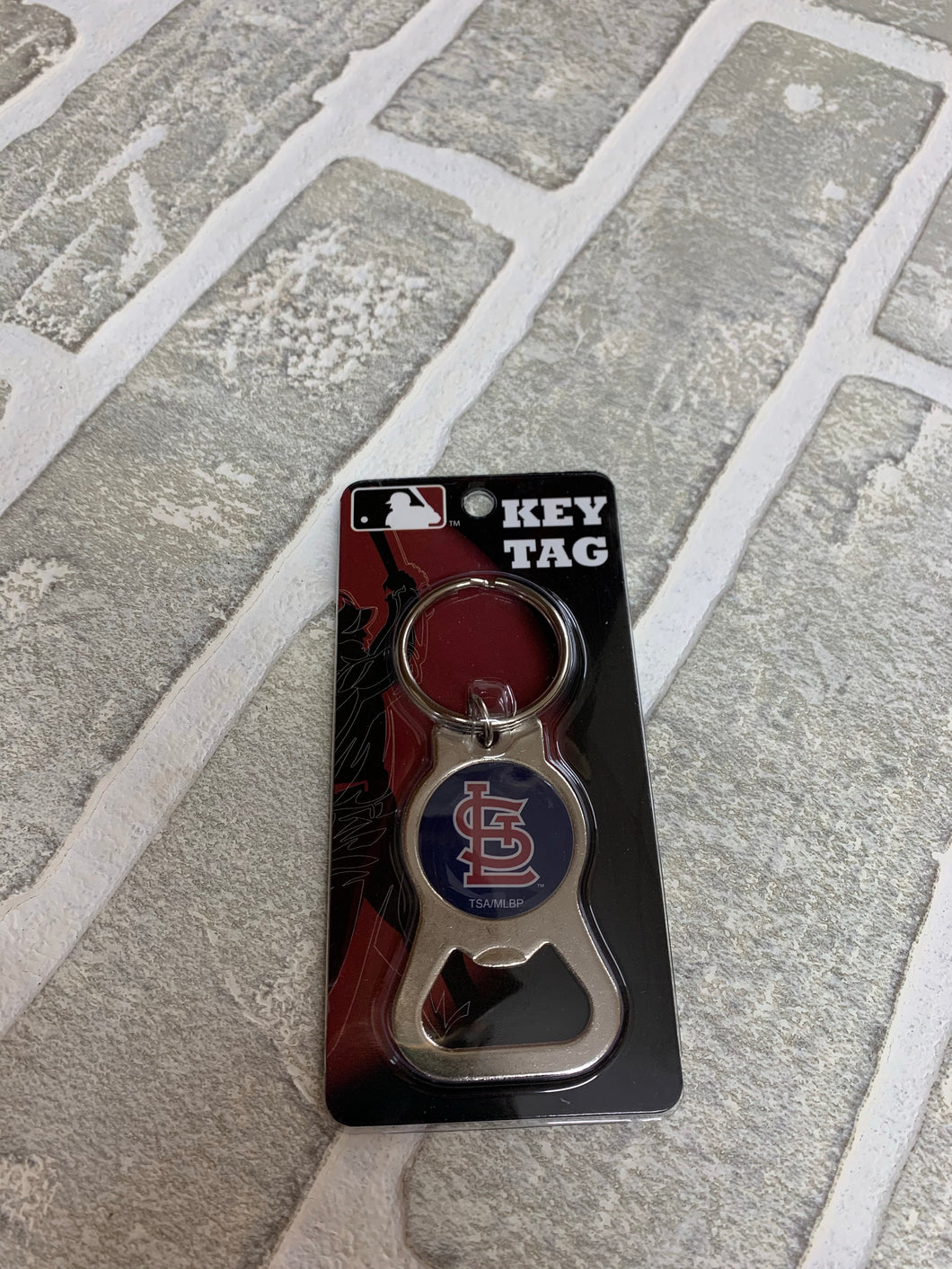 Sports bottle opener key ring